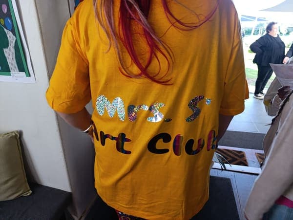 Mrs. S in the art club T-shirt