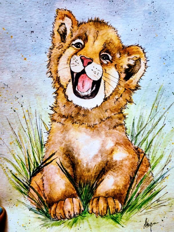 Laughing lion cub