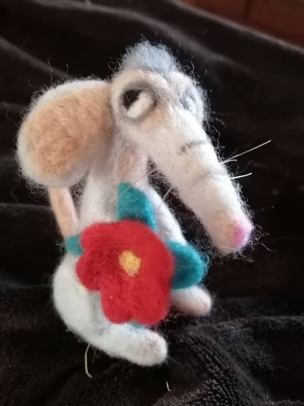 Mouse with a red flower