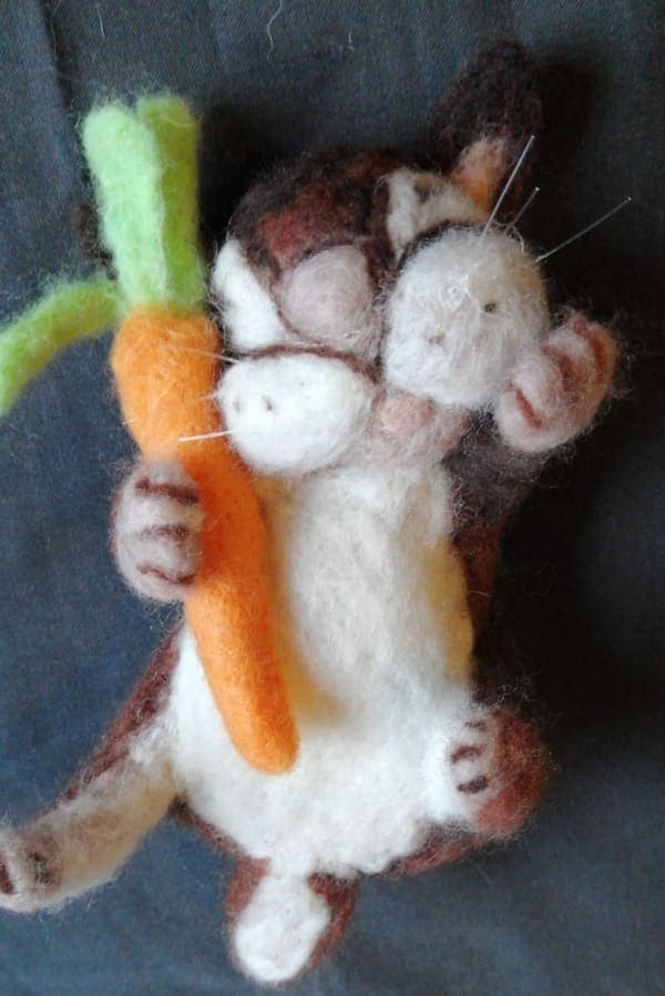 Hamster with a carrot