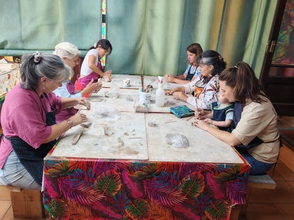 The group around the clay table