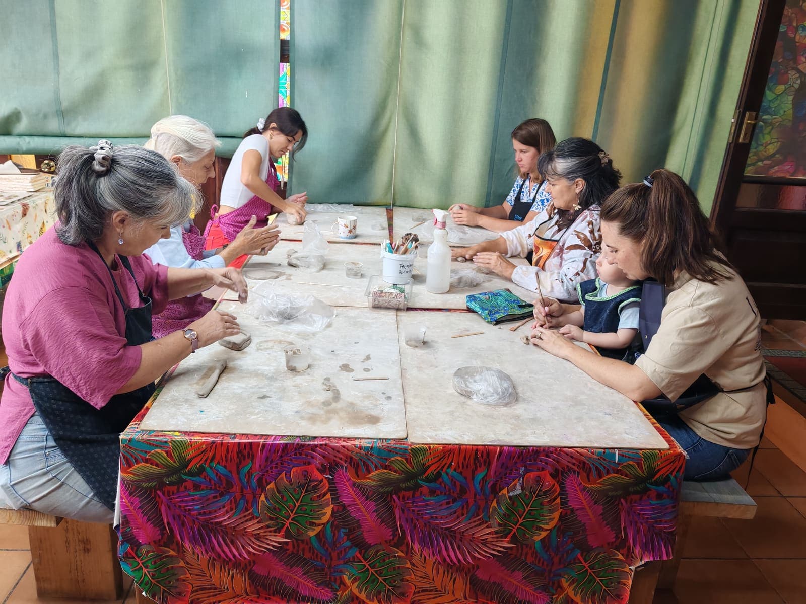 The group around the clay table