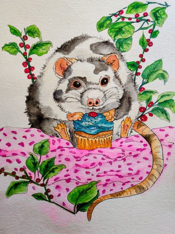 Rat with a cupcake