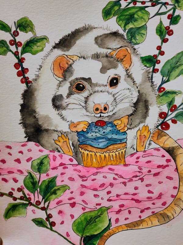 Rat with a cupcake